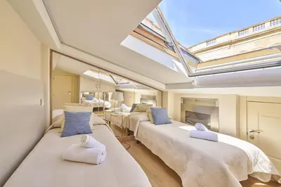 Cama o camas de una habitación en Alojamiento histórico Universidad Salamanca III