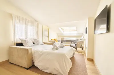 Cama o camas de una habitación en Alojamiento histórico Universidad Salamanca III