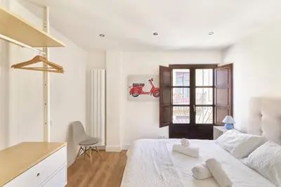 Cama o camas de una habitación en Alojamiento histórico Universidad Salamanca