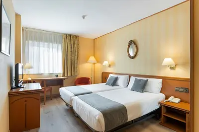 Cama o camas de una habitación en Hotel Alda Río Tormes