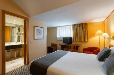 Cama o camas de una habitación en Hotel Alda Río Tormes