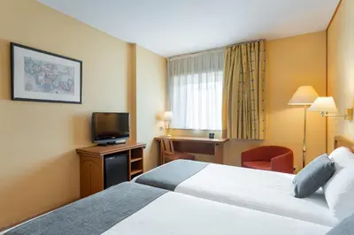 Cama o camas de una habitación en Hotel Alda Río Tormes