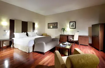 Cama o camas de una habitación en Eurostars Palacio de Santa Marta