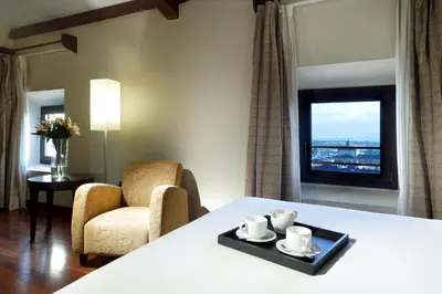 Cama o camas de una habitación en Eurostars Palacio de Santa Marta