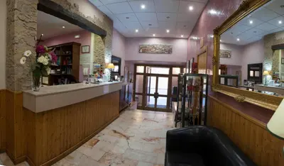 El salón o zona de bar de Hotel Alfonso IX