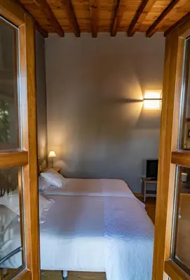 Cama o camas de una habitación en Hotel Alfonso IX