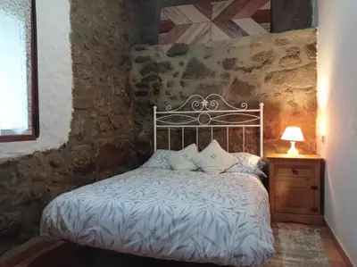 Cama o camas de una habitación en Casa Rural El Turuterro