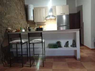 Una cocina o zona de cocina en Casa Rural El Turuterro