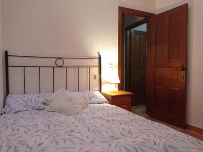 Cama o camas de una habitación en Casa Rural El Turuterro