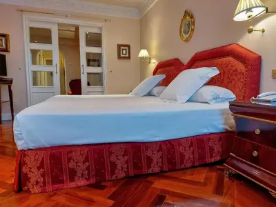 Cama o camas de una habitación en Hotel Alameda Palace