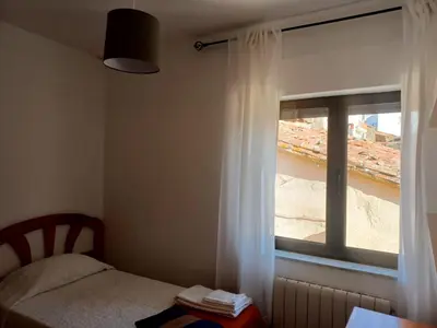 Cama o camas de una habitación en Casa rural Las Peñas
