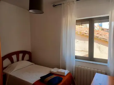 Cama o camas de una habitación en Casa rural Las Peñas