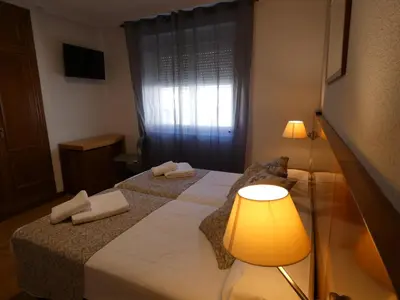 Cama o camas de una habitación en Hotel Mercado by gaiarooms