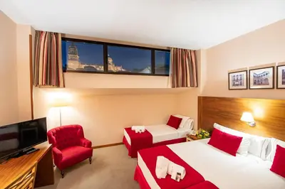 Cama o camas de una habitación en Hospedium Hotel Casino Del Tormes