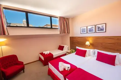 Cama o camas de una habitación en Hospedium Hotel Casino Del Tormes