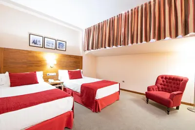 Cama o camas de una habitación en Hospedium Hotel Casino Del Tormes