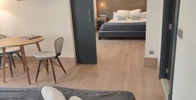 Cama o camas de una habitación en Hotel Sercotel Cuatro Postes