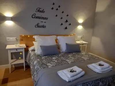Cama o camas de una habitación en CASA RURAL LA HOJA EL VALLE
