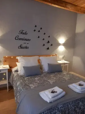 Cama o camas de una habitación en CASA RURAL LA HOJA EL VALLE