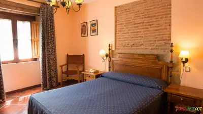 Cama o camas de una habitación en Hotel Las Cancelas