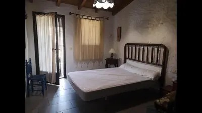 Cama o camas de una habitación en Rural House Mirador del Castillo