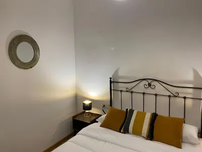 Cama o camas de una habitación en Apartamento Plaza Mayor Salamanca con 2 balcones a la misma Plaza Mayor