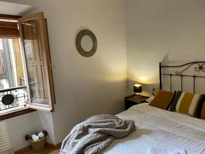 Cama o camas de una habitación en Apartamento Plaza Mayor Salamanca con 2 balcones a la misma Plaza Mayor