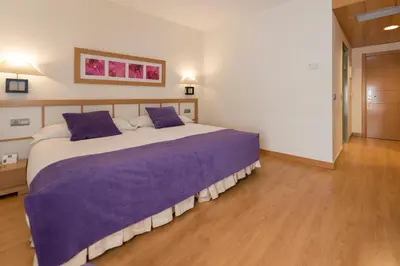 Cama o camas de una habitación en Itaca Salamanca by Soho Boutique
