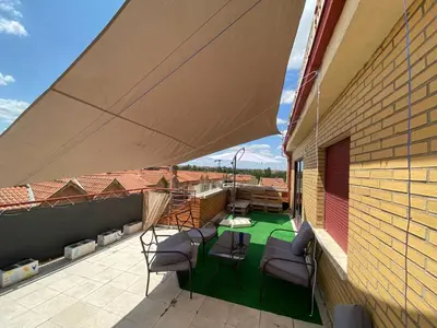 Zona de estar de ATICO Romo