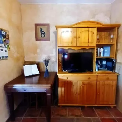Una televisión o centro de entretenimiento en Casa Vaélico