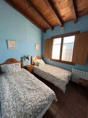 Cama o camas de una habitación en Casa Rural Amarilla