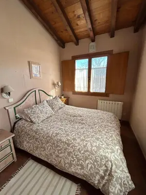Cama o camas de una habitación en Casa Rural Amarilla