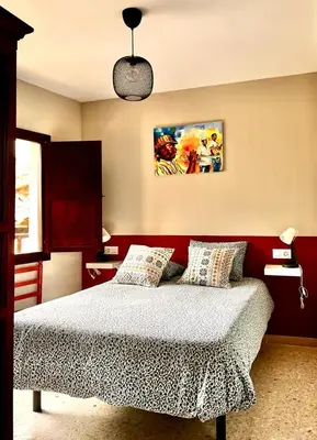 Cama o camas de una habitación en Casa Rural 