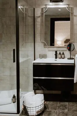 Un baño de Apartamentos Boutique Heritage