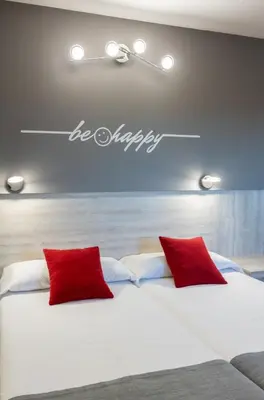 Cama o camas de una habitación en Hotel Mozárbez Salamanca