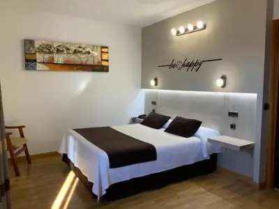 Cama o camas de una habitación en Hotel Mozárbez Salamanca