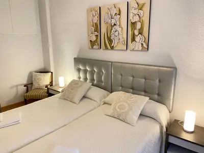 Cama o camas de una habitación en Apartamento Libreros Centro Histórico - PARKING GRATIS