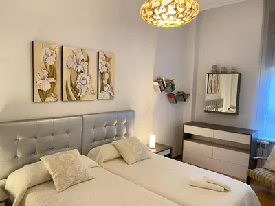 Cama o camas de una habitación en Apartamento Libreros Centro Histórico - PARKING GRATIS