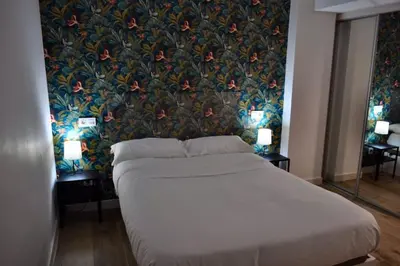 Cama o camas de una habitación en II Precioso apartamento con vistas a la Catedral