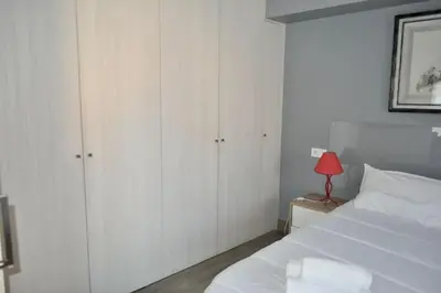 Cama o camas de una habitación en III Apartamento junto a PLAZA MAYOR