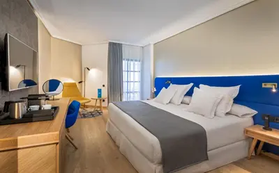 Cama o camas de una habitación en Barceló Cáceres V Centenario