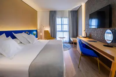 Cama o camas de una habitación en Barceló Cáceres V Centenario