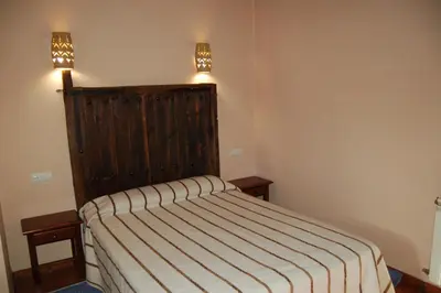 Cama o camas de una habitación en Casita del jardin