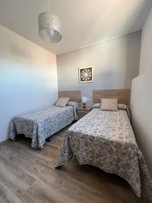 Cama o camas de una habitación en Casa Rural 