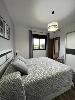 Cama o camas de una habitación en Casa Rural 
