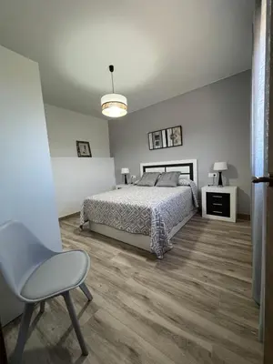 Cama o camas de una habitación en Casa Rural 