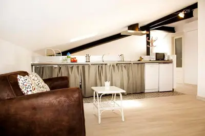 Una cocina o zona de cocina en Precioso estudio