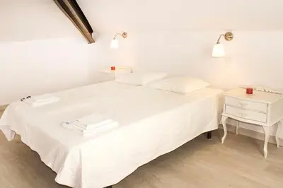Cama o camas de una habitación en Precioso estudio