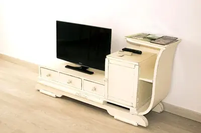 Una televisión o centro de entretenimiento en Precioso estudio