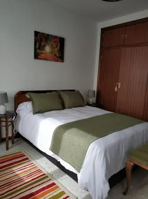 Cama o camas de una habitación en La lechuza blanca